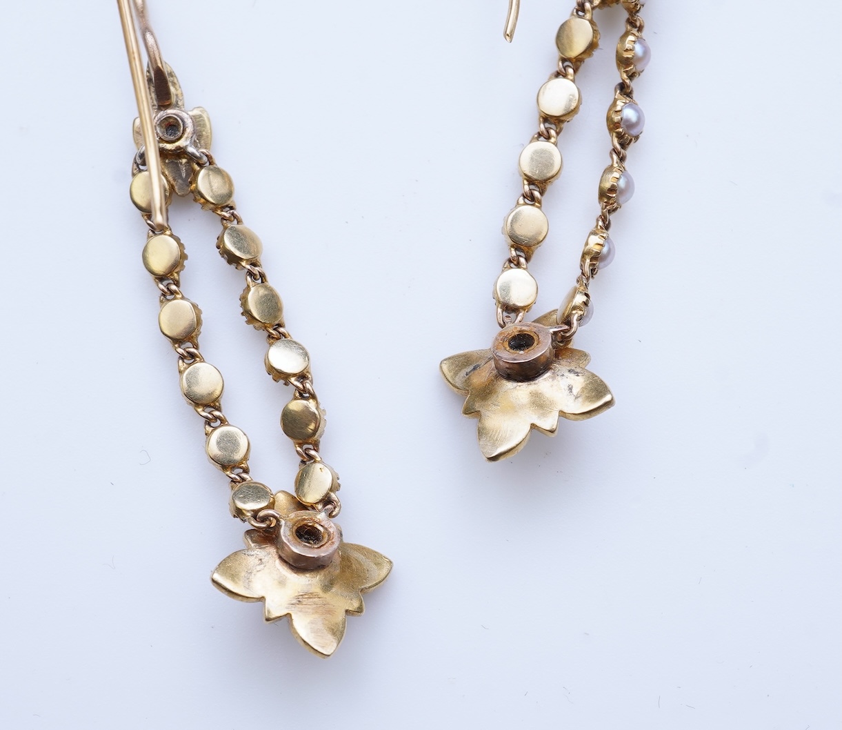 A pair of Edwardian seed pearl earrings, early 20th century composite